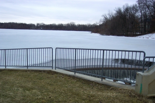 Dam on icy lake